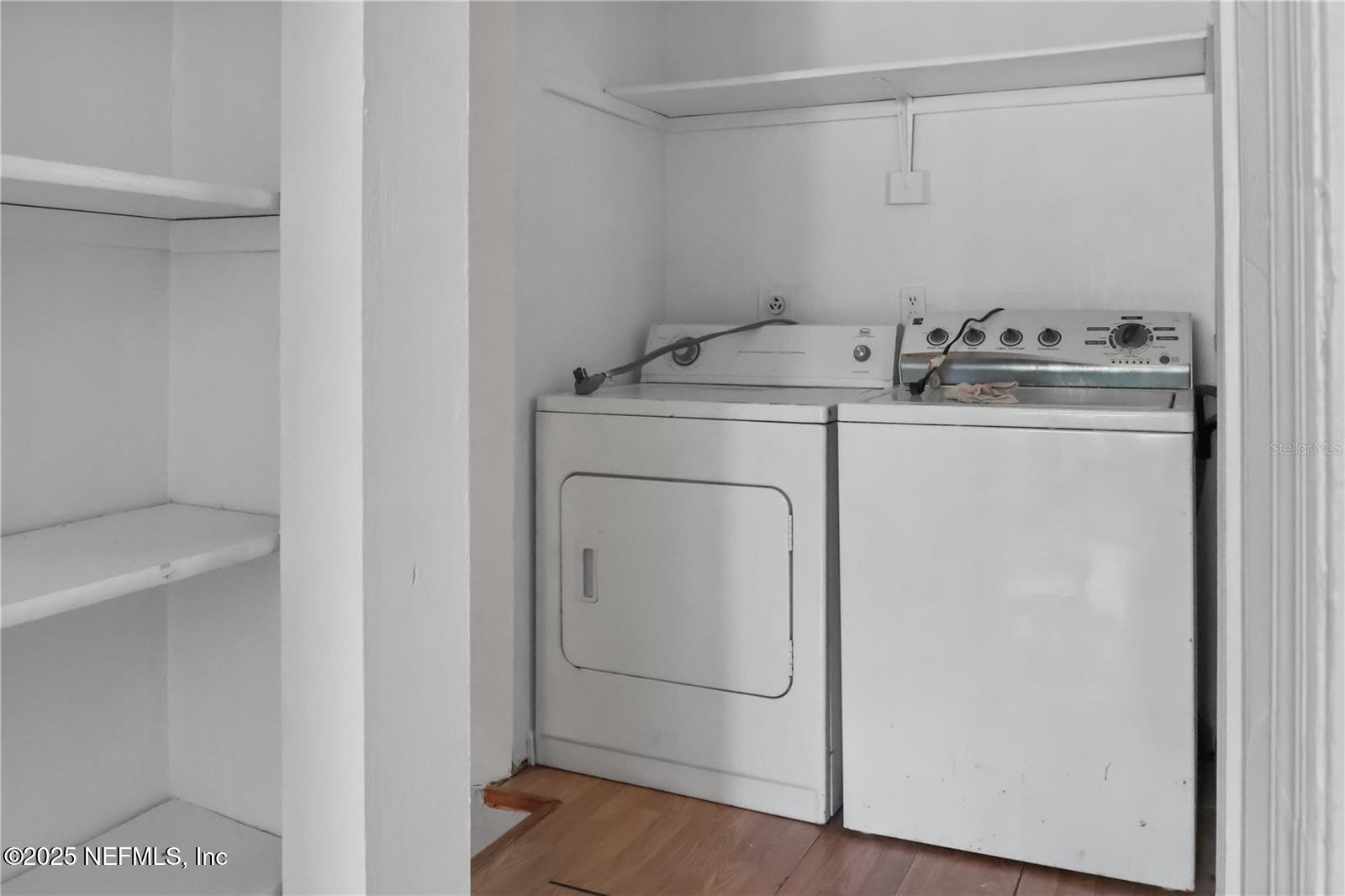 1110 Southwest 62nd Terrace Gainesville, FL 32607 - Photo 17 of 24 a utility room with dryer and washer