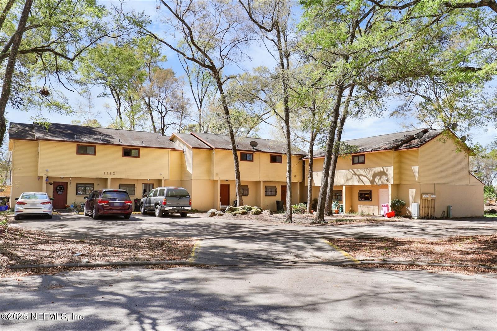 1110 Southwest 62nd Terrace Gainesville, FL 32607 - Photo 2 of 24 a view of a building with a street view