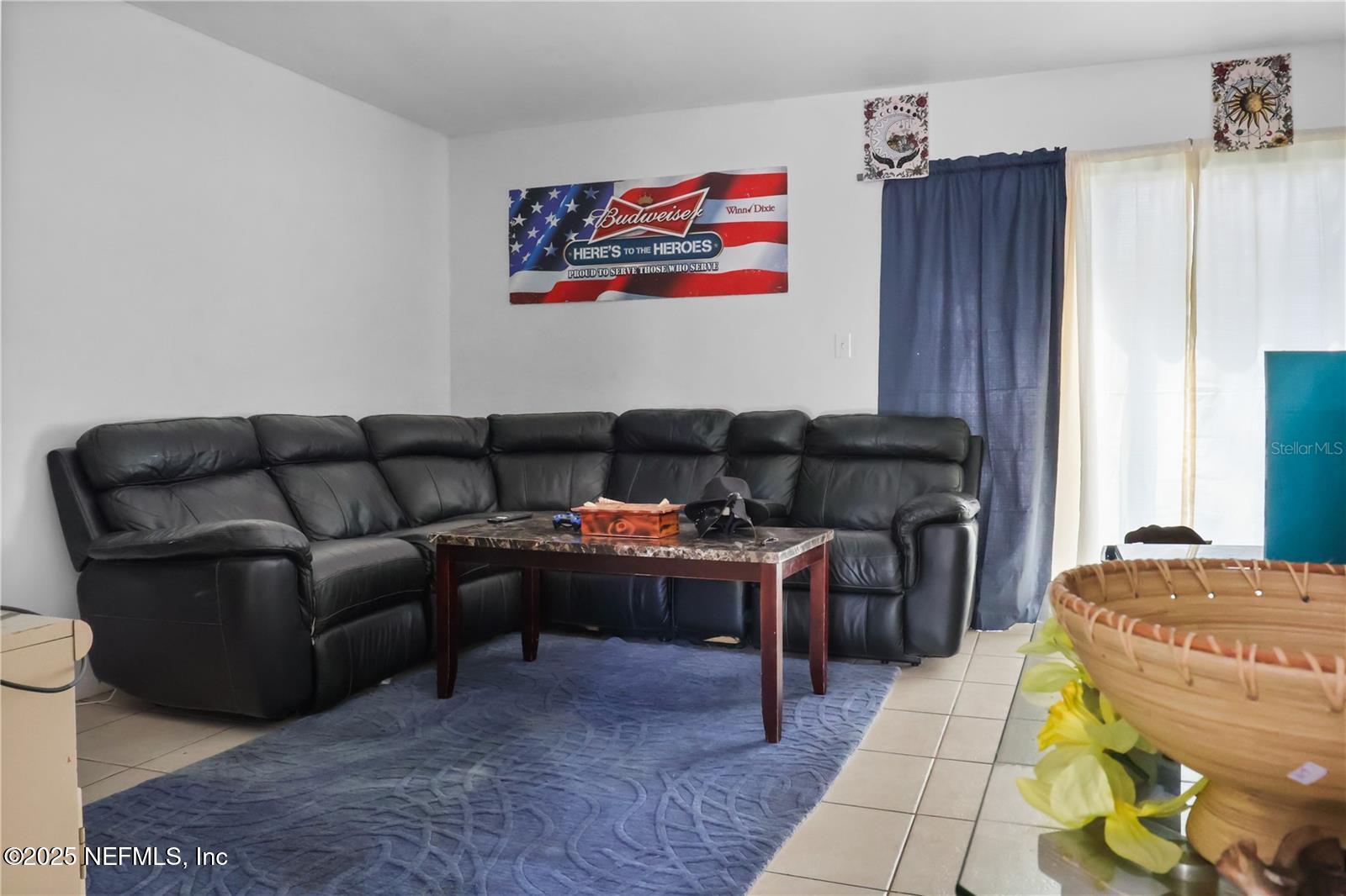 1110 Southwest 62nd Terrace Gainesville, FL 32607 - Photo 3 of 24 a living room with furniture and a couch