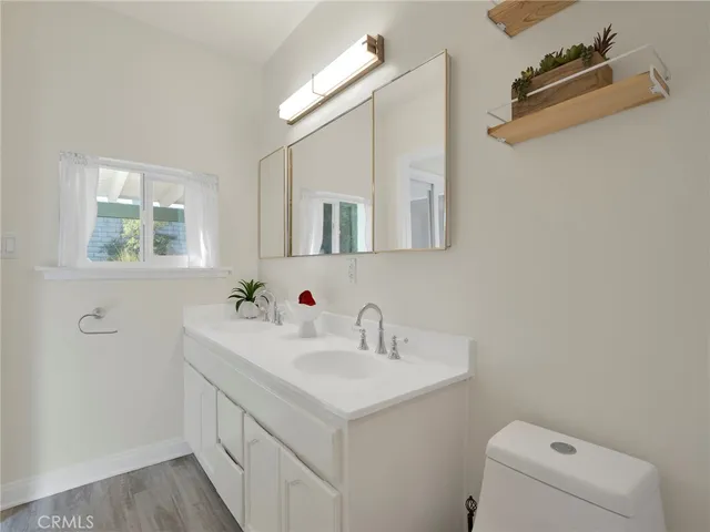 a bathroom with a sink and a toilet