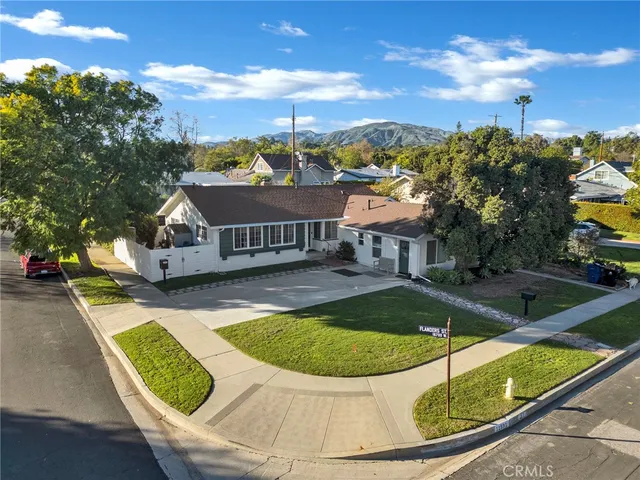 a view of a swimming pool with a lounge chairs