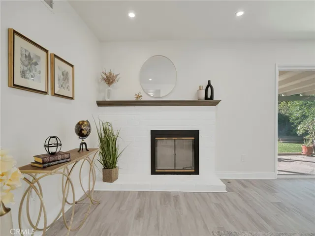 a living room with wooden floor