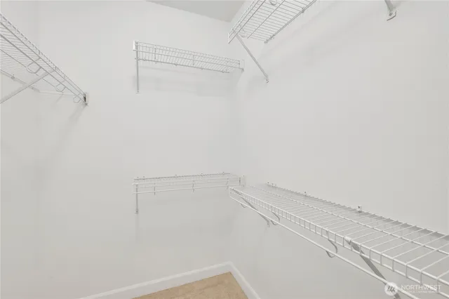 a view of a room with racks on the wall