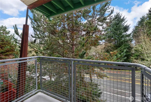 a view of a balcony with an outdoor space