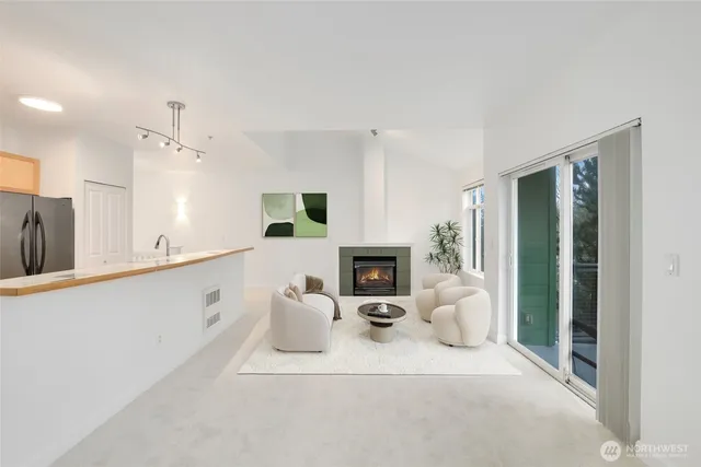 a bedroom with furniture and a fireplace