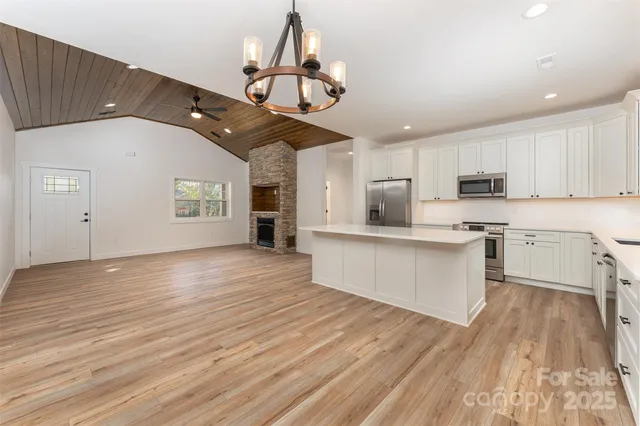 an aerial view of a house with roof yard