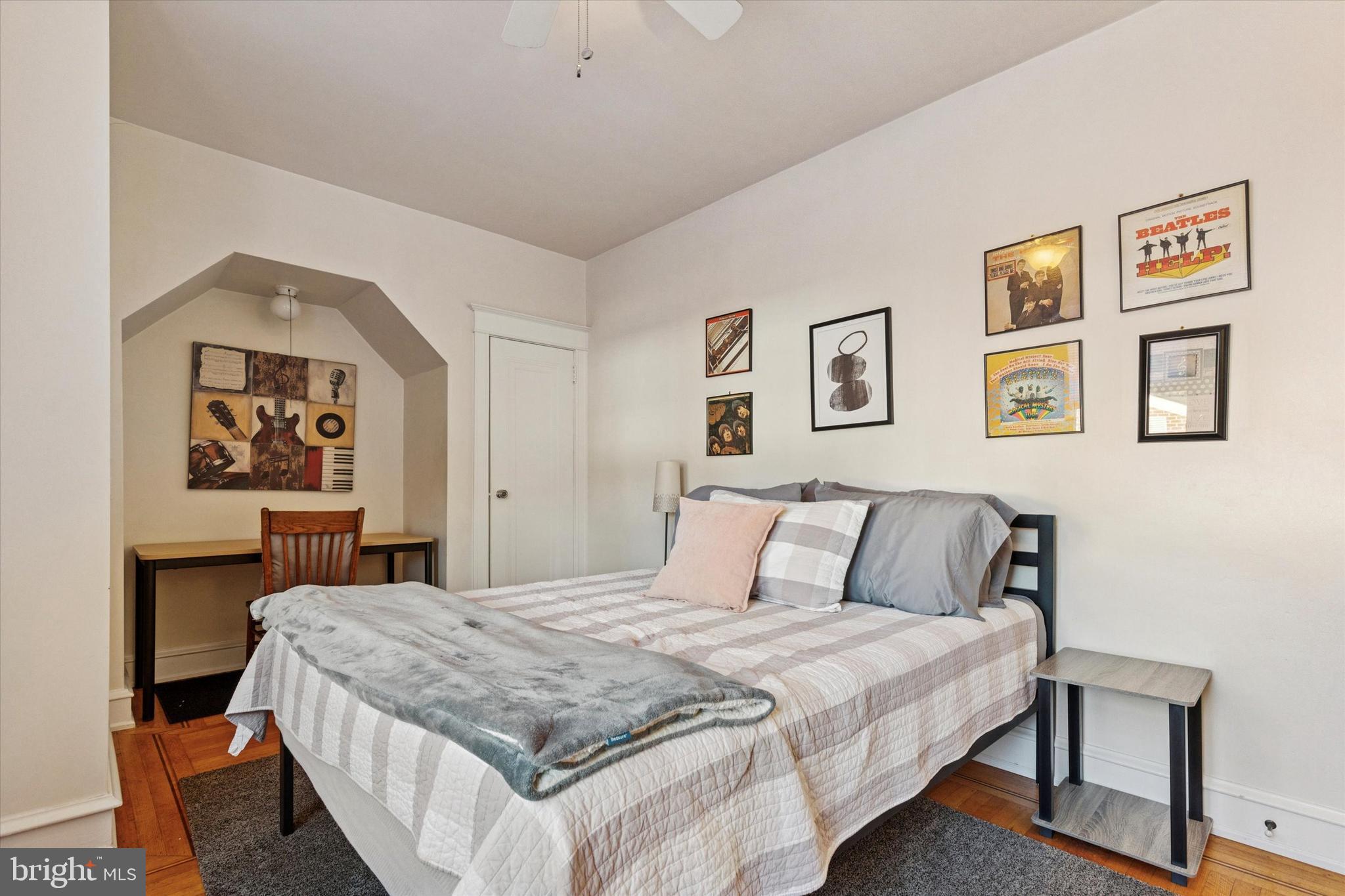 6329 East Valley Green Road Flourtown, PA 19031 - Photo 16 of 23 a bedroom with a large bed and a painting on the wall