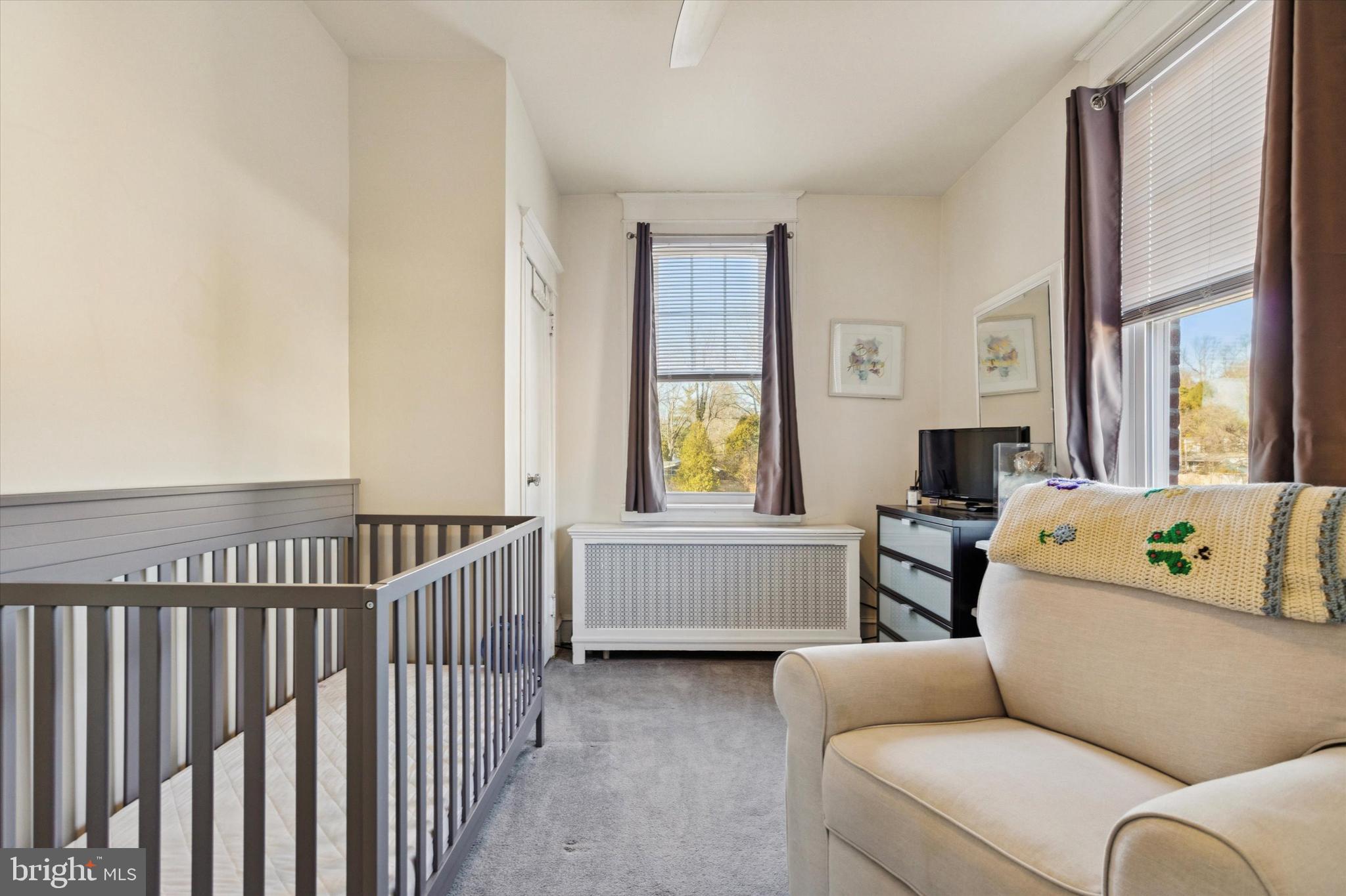 6329 East Valley Green Road Flourtown, PA 19031 - Photo 18 of 23 a living room with furniture and a window