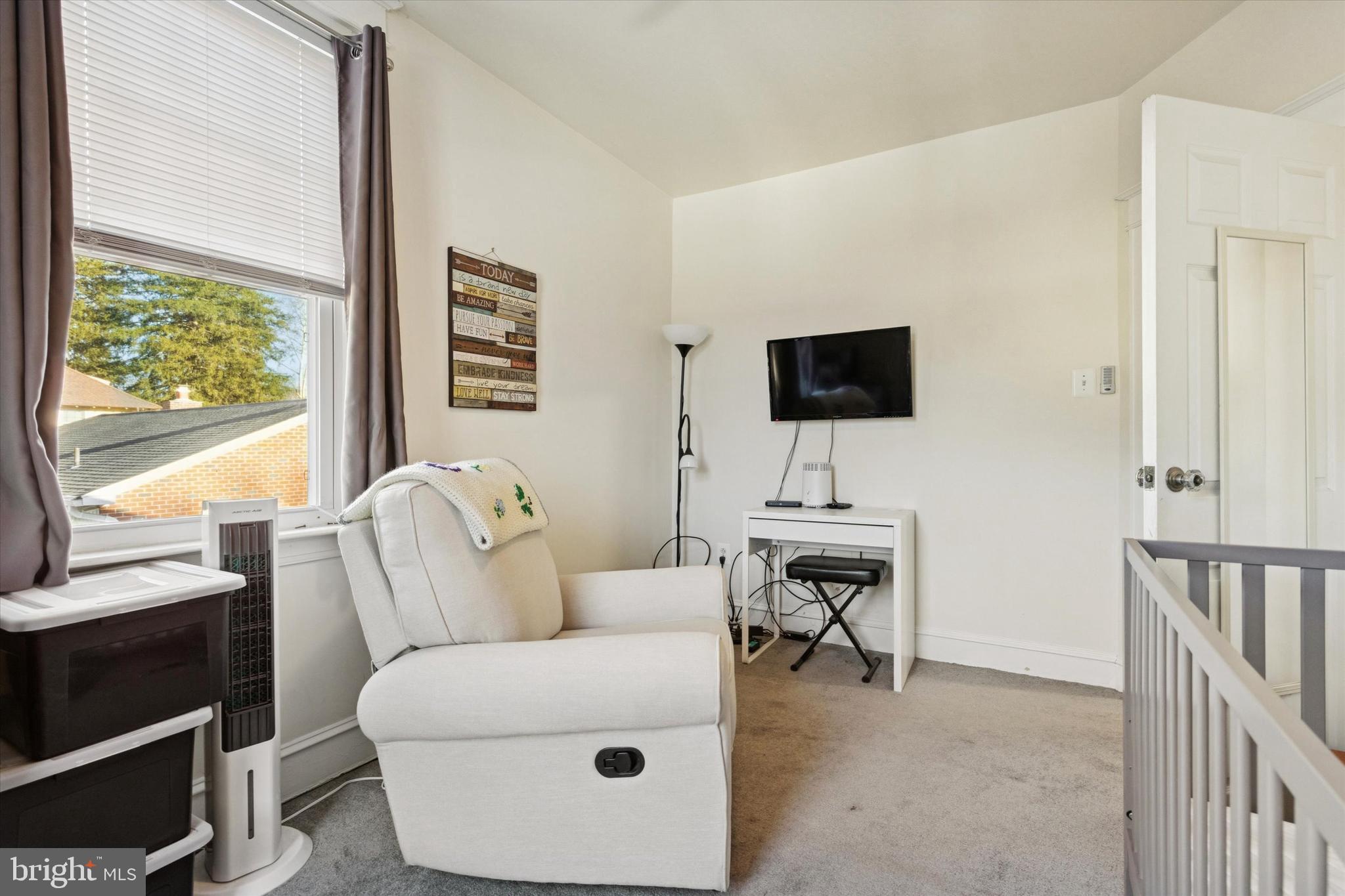 6329 East Valley Green Road Flourtown, PA 19031 - Photo 19 of 23 a living room with furniture and a flat screen tv