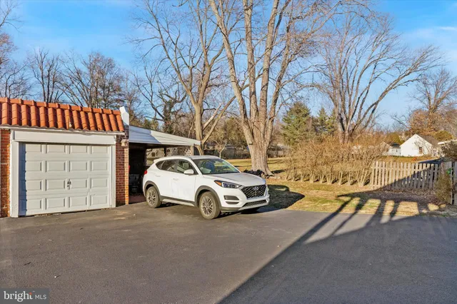 a car parked in front of a house