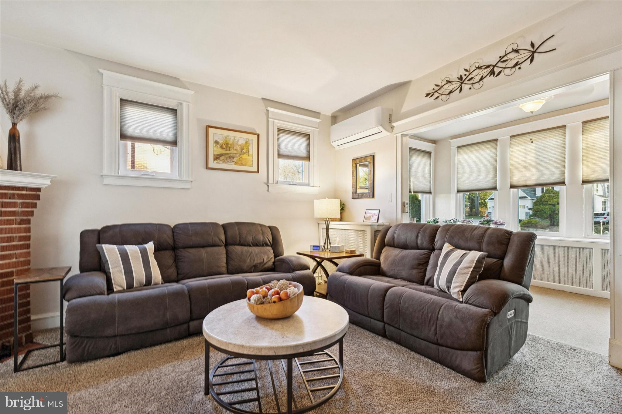 6329 East Valley Green Road Flourtown, PA 19031 - Photo 4 of 23 a living room with furniture and a large window