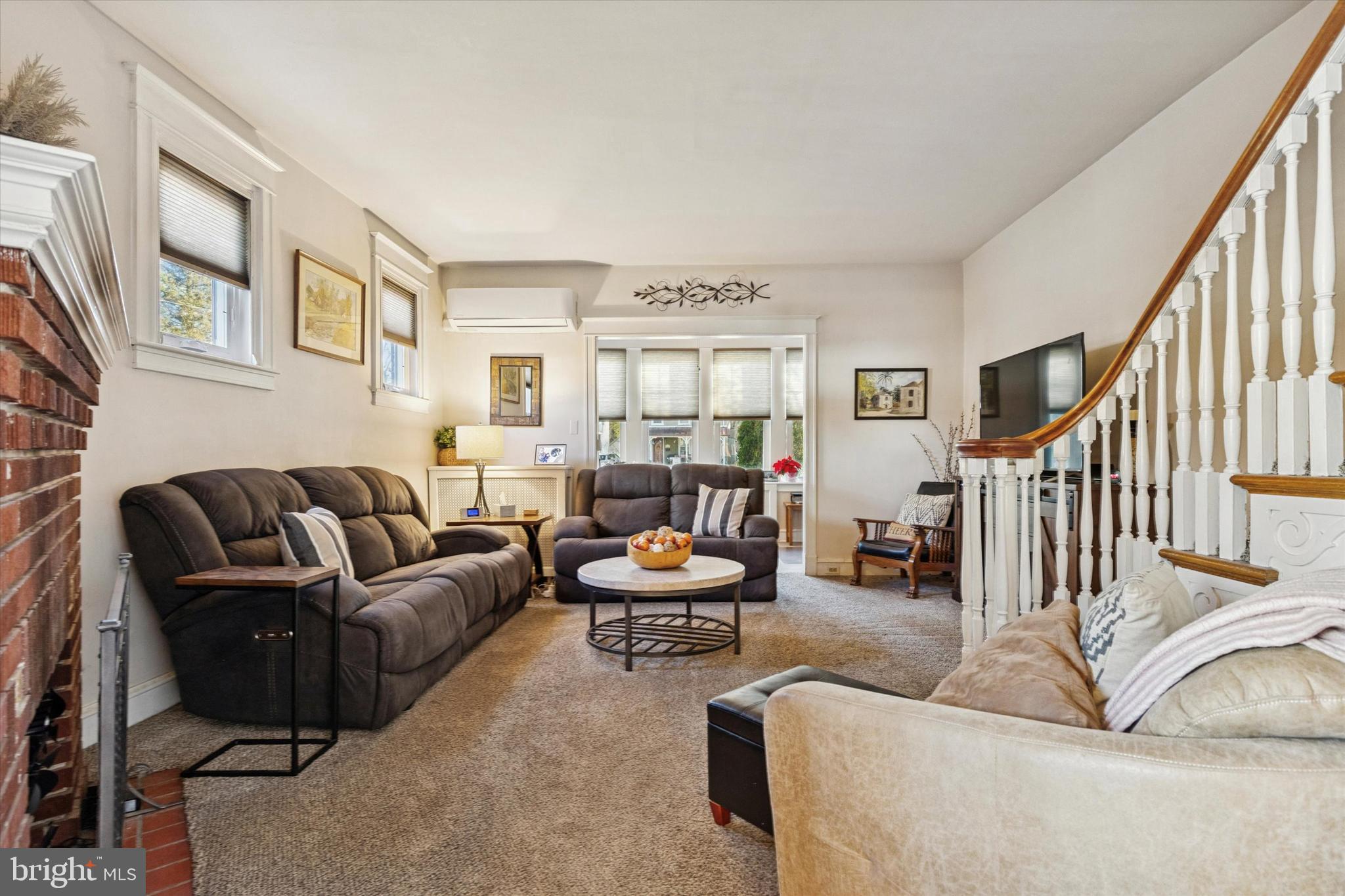 6329 East Valley Green Road Flourtown, PA 19031 - Photo 5 of 23 a living room with furniture and a large window