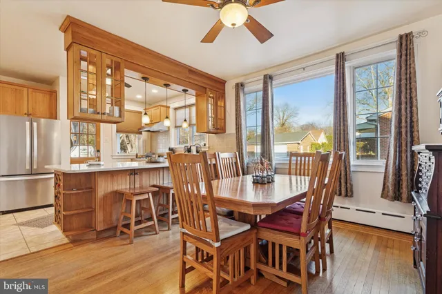 a dining room with furniture window wooden floor