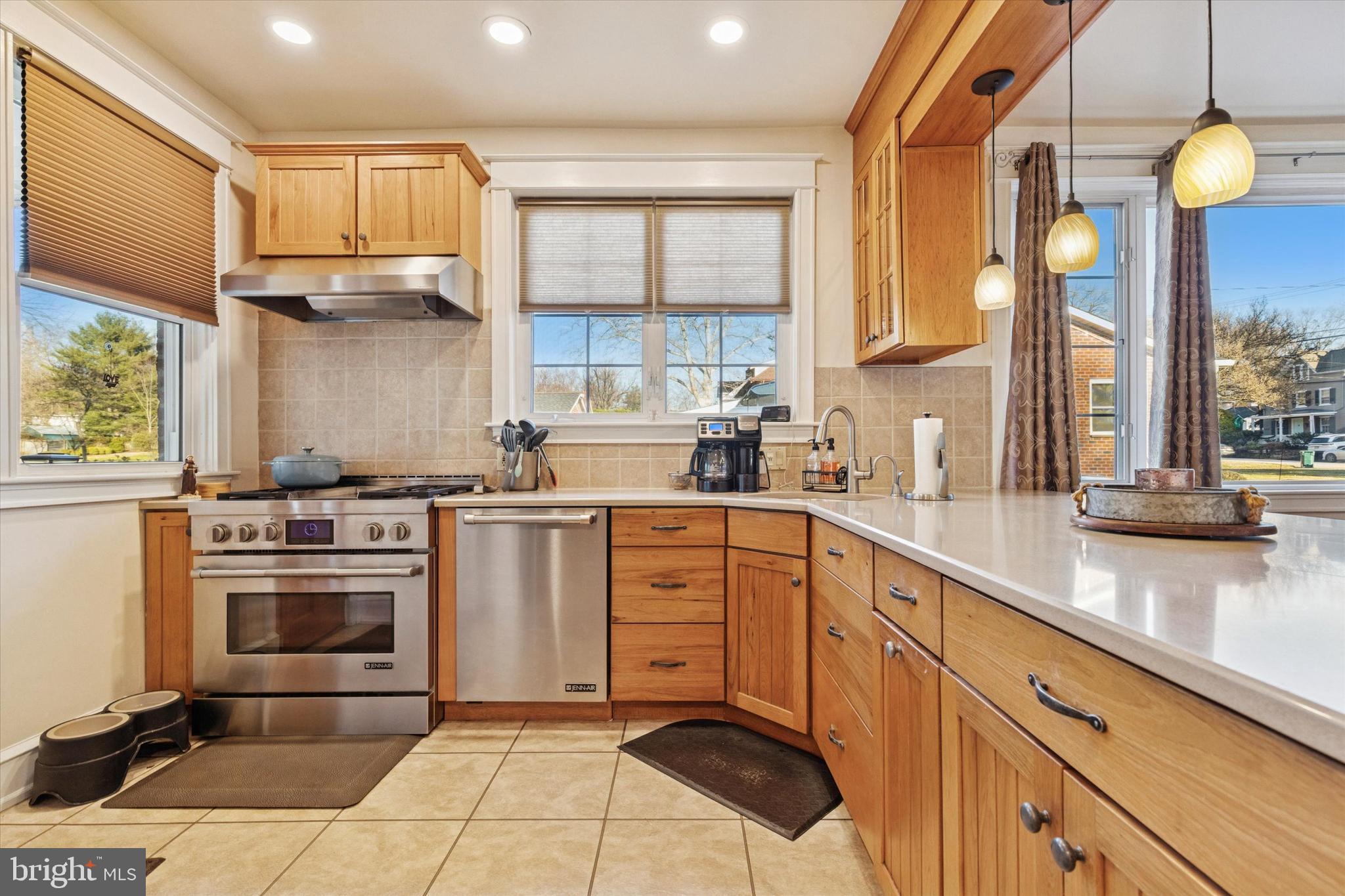 6329 East Valley Green Road Flourtown, PA 19031 - Photo 10 of 23 a kitchen with a stove a sink and a refrigerator
