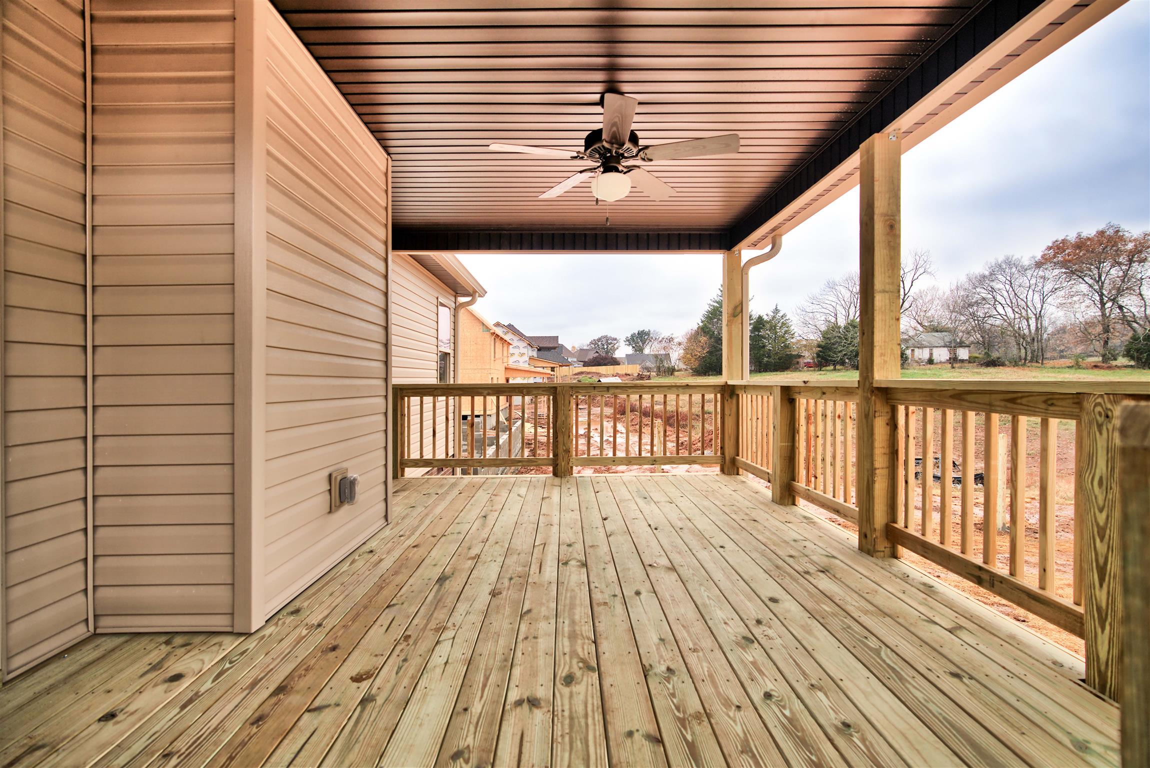 779 Grindstone Hollow Road Dickson, TN 37055 - Photo 20 of 24 Covered Deck (Sample Photos from lot 91 Griffey Estates)