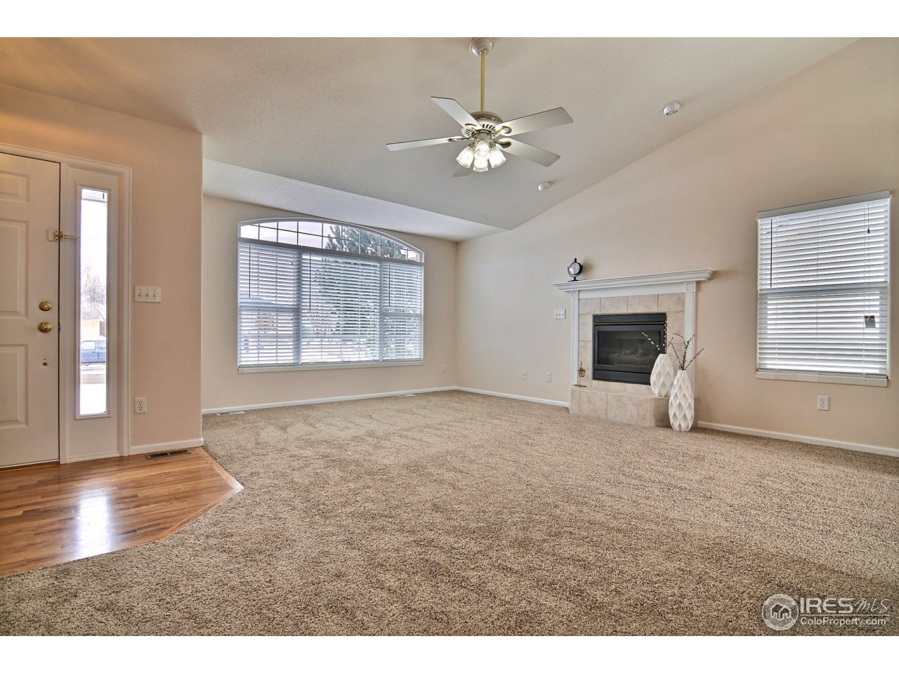 5608 West 13th Street Road Greeley, CO 80634 - Photo 3 of 25 Front Door Opens Up To This Lovely Living Room