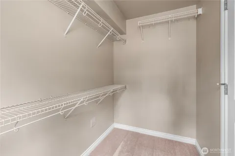 a view of a room with racks on the wall