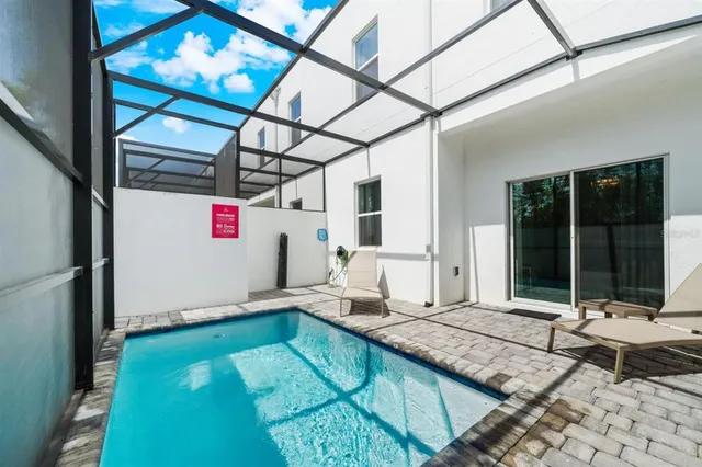 a view of a city with lawn chairs