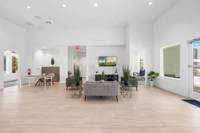 a view of a living room and dining room