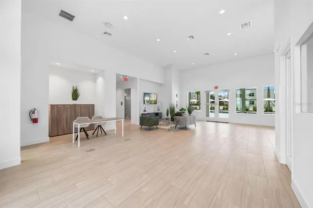 a kitchen with stainless steel appliances a refrigerator and a sink