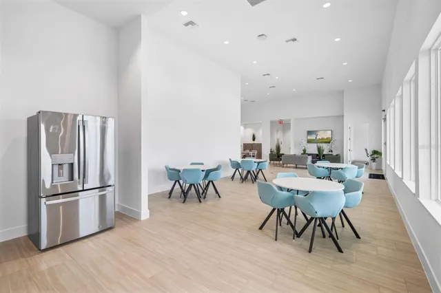a view of a dining room with furniture window and outside view