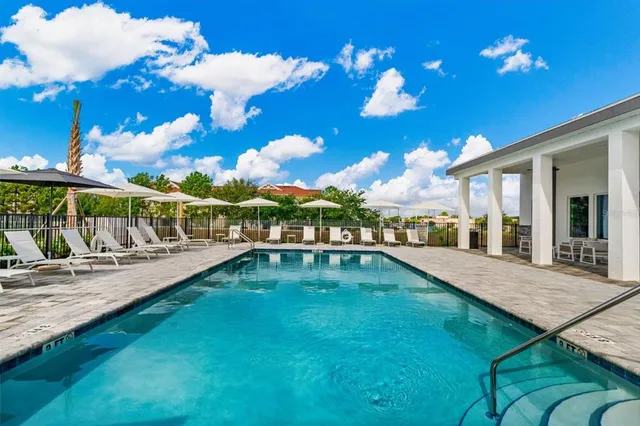 a view of a house with a swimming pool
