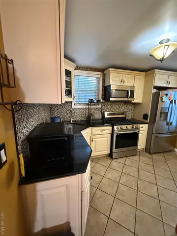 $980,000 | 131-07 107th Avenue | South Ozone Park