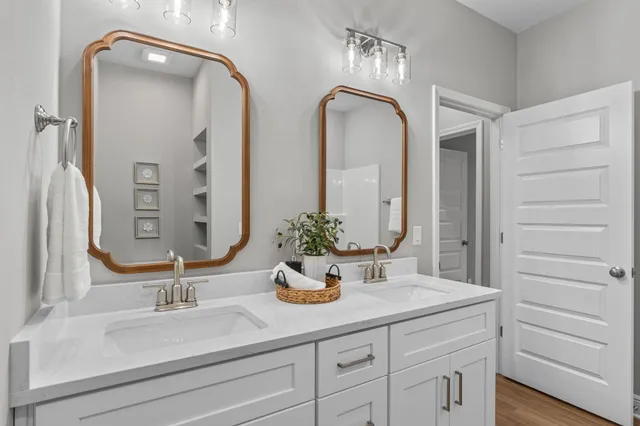 a bathroom with sink and mirror