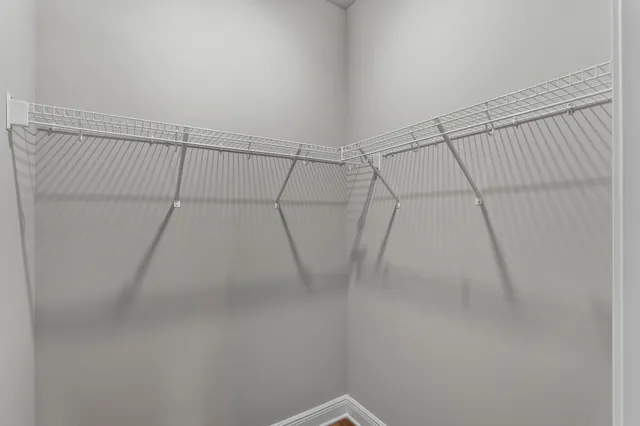 a view of a room with racks on the wall