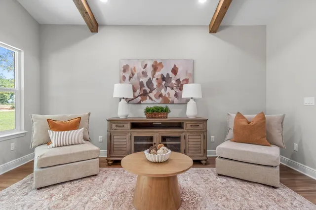 a living room with furniture and a couch