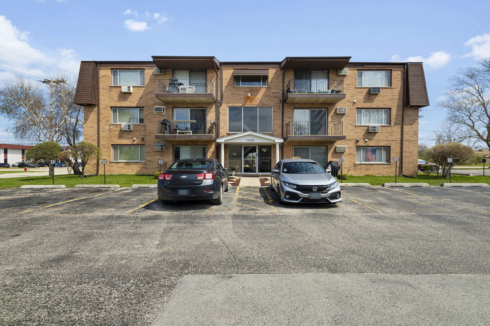 11000 Central Avenue, Unit 1A Chicago Ridge, IL 60415 - Photo 15 of 15 a car parked in front of a building