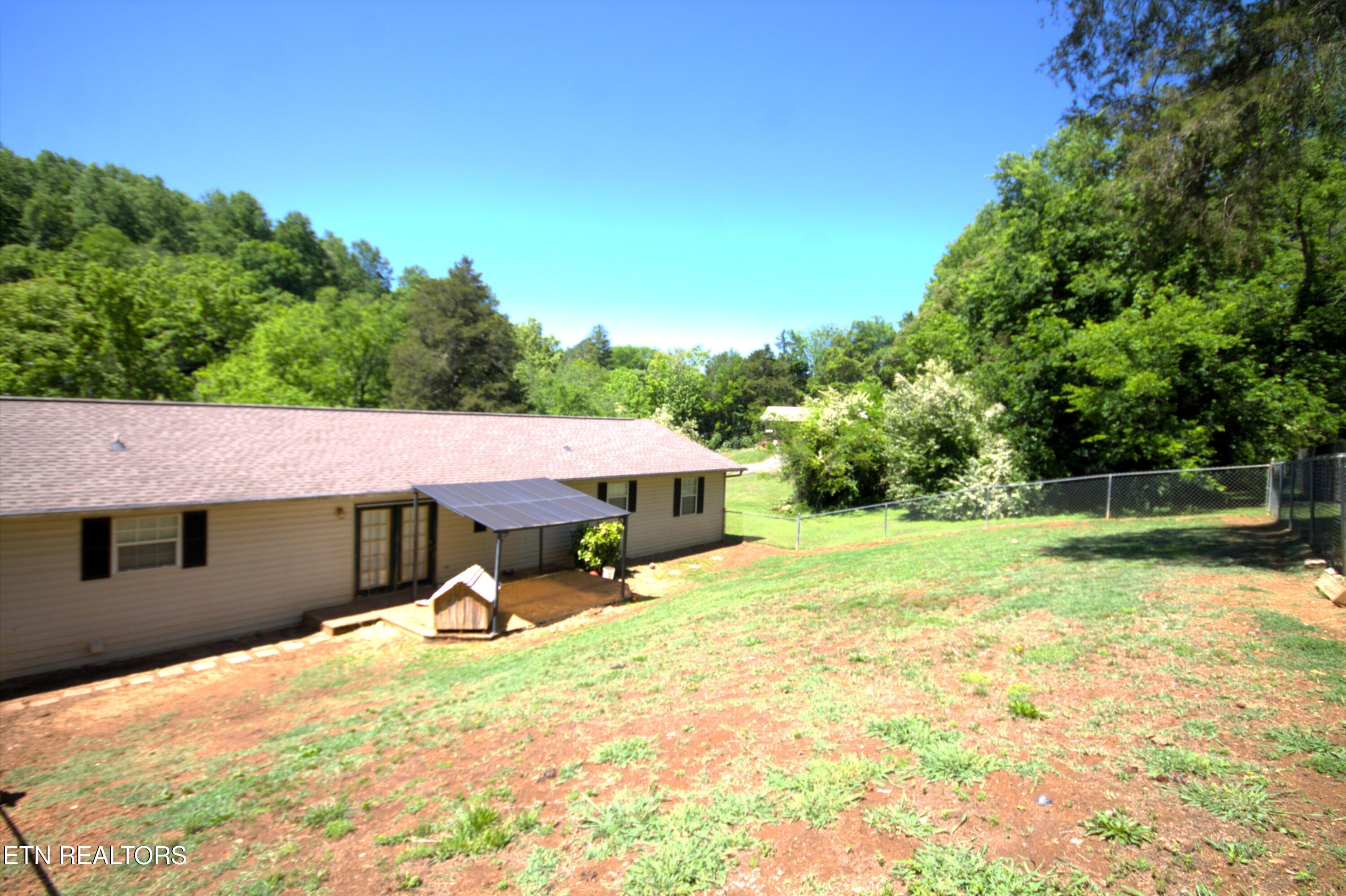 724 Lower Quarry Road Newport, TN 37821 - Photo 14 of 18 Fenced Backyard