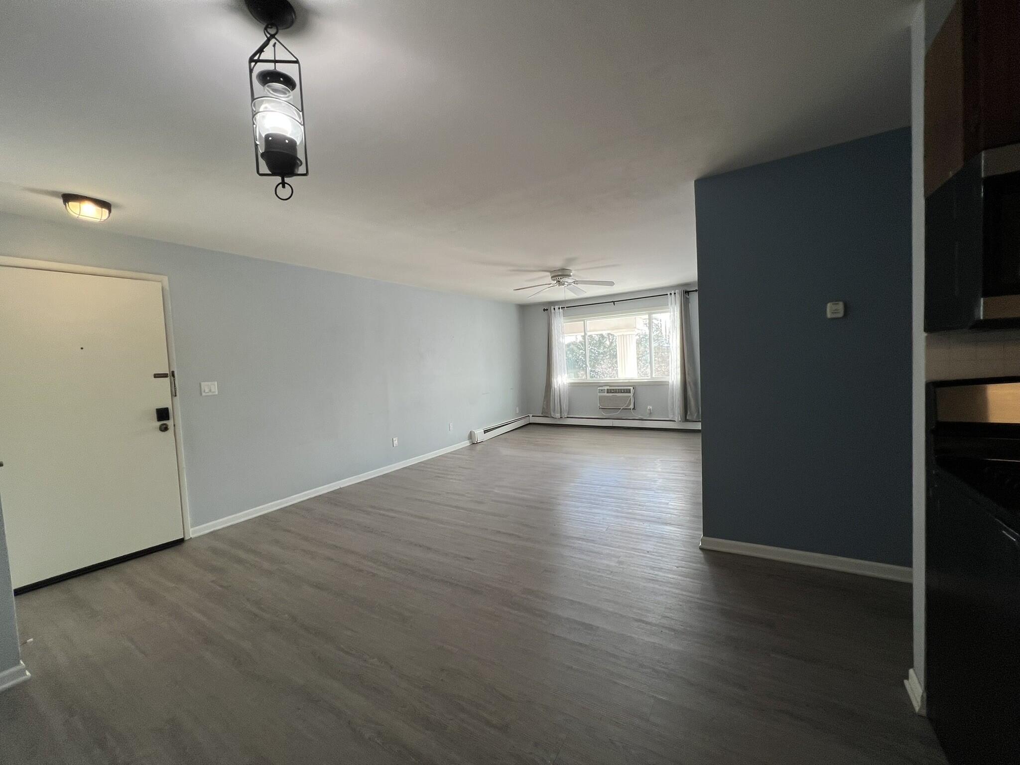 255 Elmwood Avenue, Unit 309 Lake Geneva, WI 53147 - Photo 12 of 19 Dining Living Room