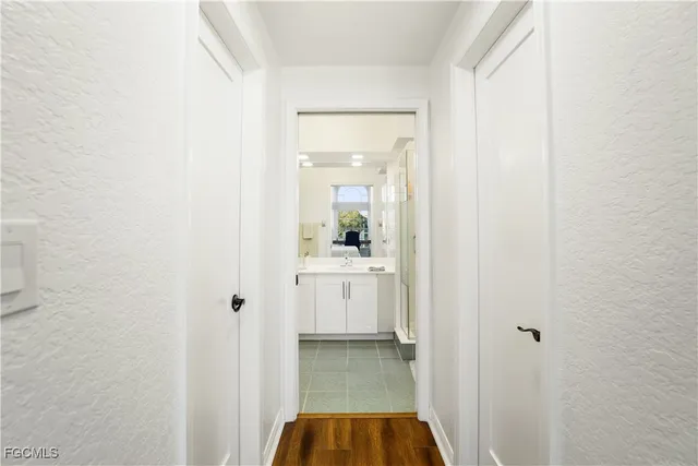 a bathroom with a sink and mirror