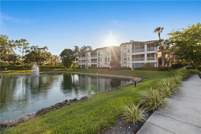 a view of a lake with a city