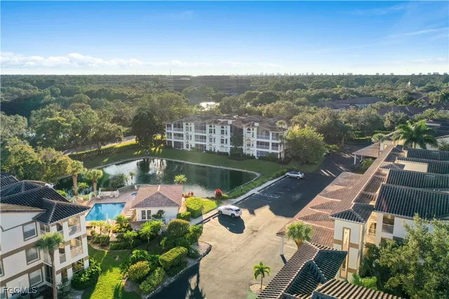 an aerial view of residential building and lake view