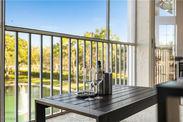 a view of a balcony with wooden floor