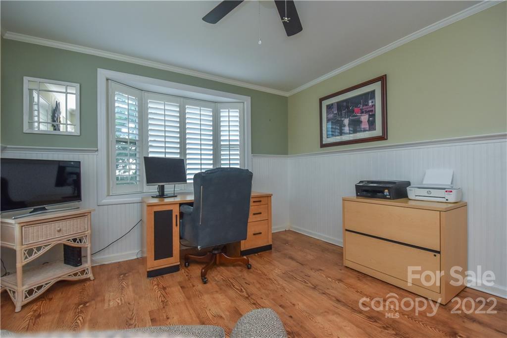 3403 Lake Shore Road South Denver, NC 28037 - Photo 25 of 37 a view of a workspace with furniture and a window