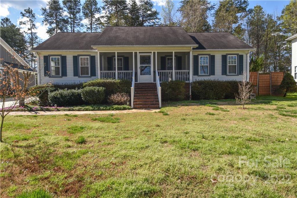 3403 Lake Shore Road South Denver, NC 28037 - Photo 27 of 37 a front view of a house with a yard