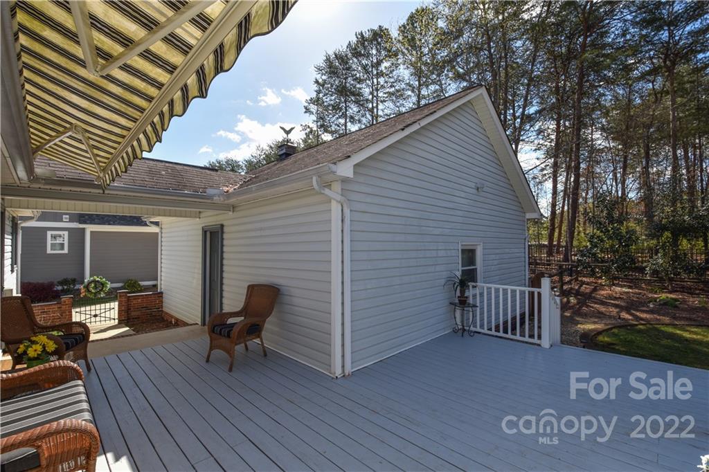3403 Lake Shore Road South Denver, NC 28037 - Photo 29 of 37 a view of backyard with a deck and wooden floor