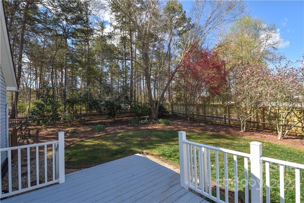 3403 Lake Shore Road South Denver, NC 28037 - Photo 31 of 37 a view of a garden with wooden floor