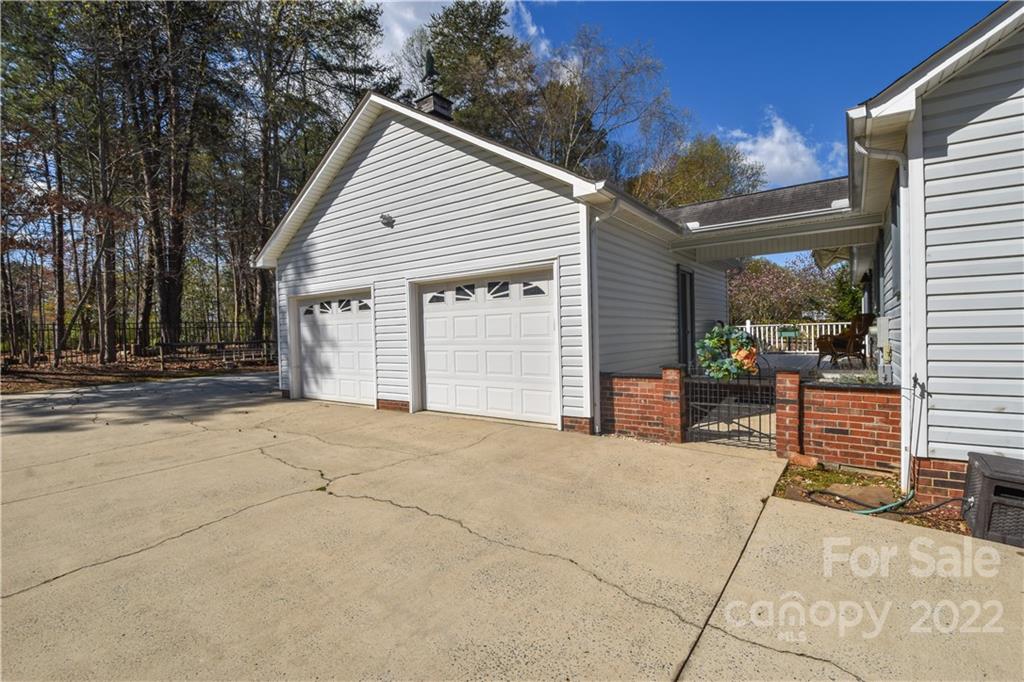 3403 Lake Shore Road South Denver, NC 28037 - Photo 33 of 37 a view of a house with a patio