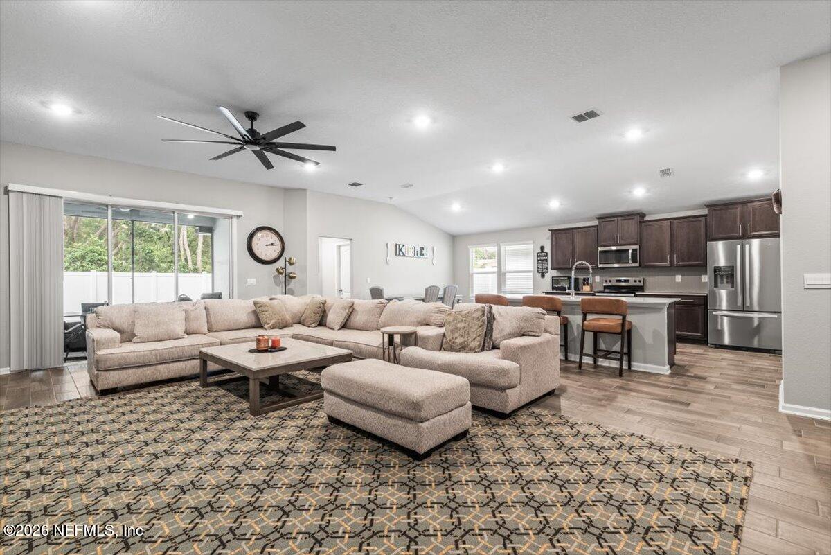 40 Pecan Rdg Court Jacksonville, FL 32218 - Photo 7 of 37 Great Room into Kitchen and Cafe Area