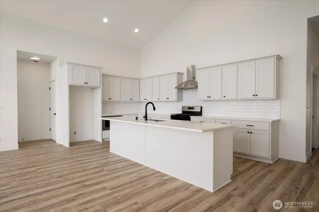 a view of kitchen with wooden floor