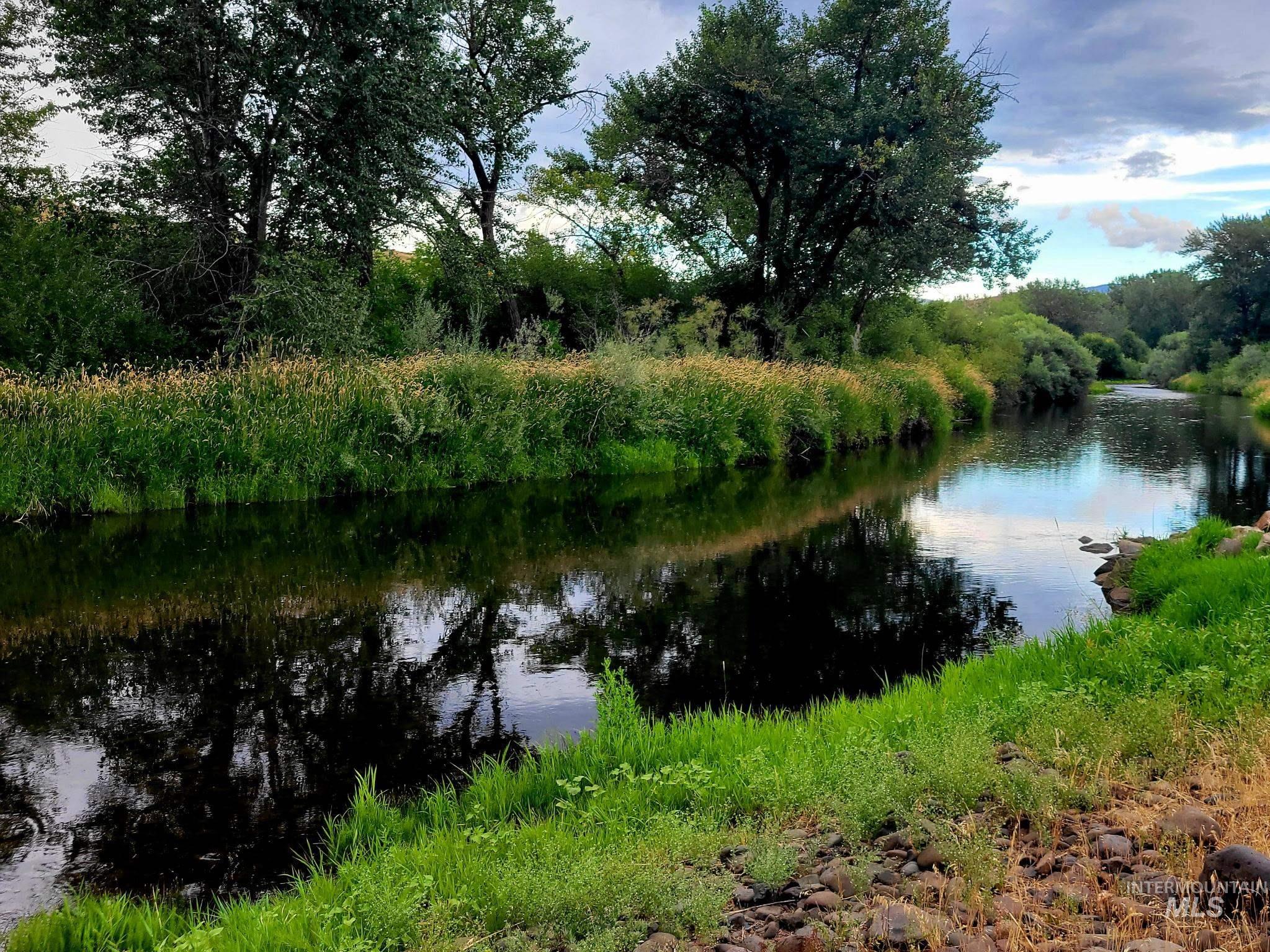 Weiser River bordering property. River flows year around
