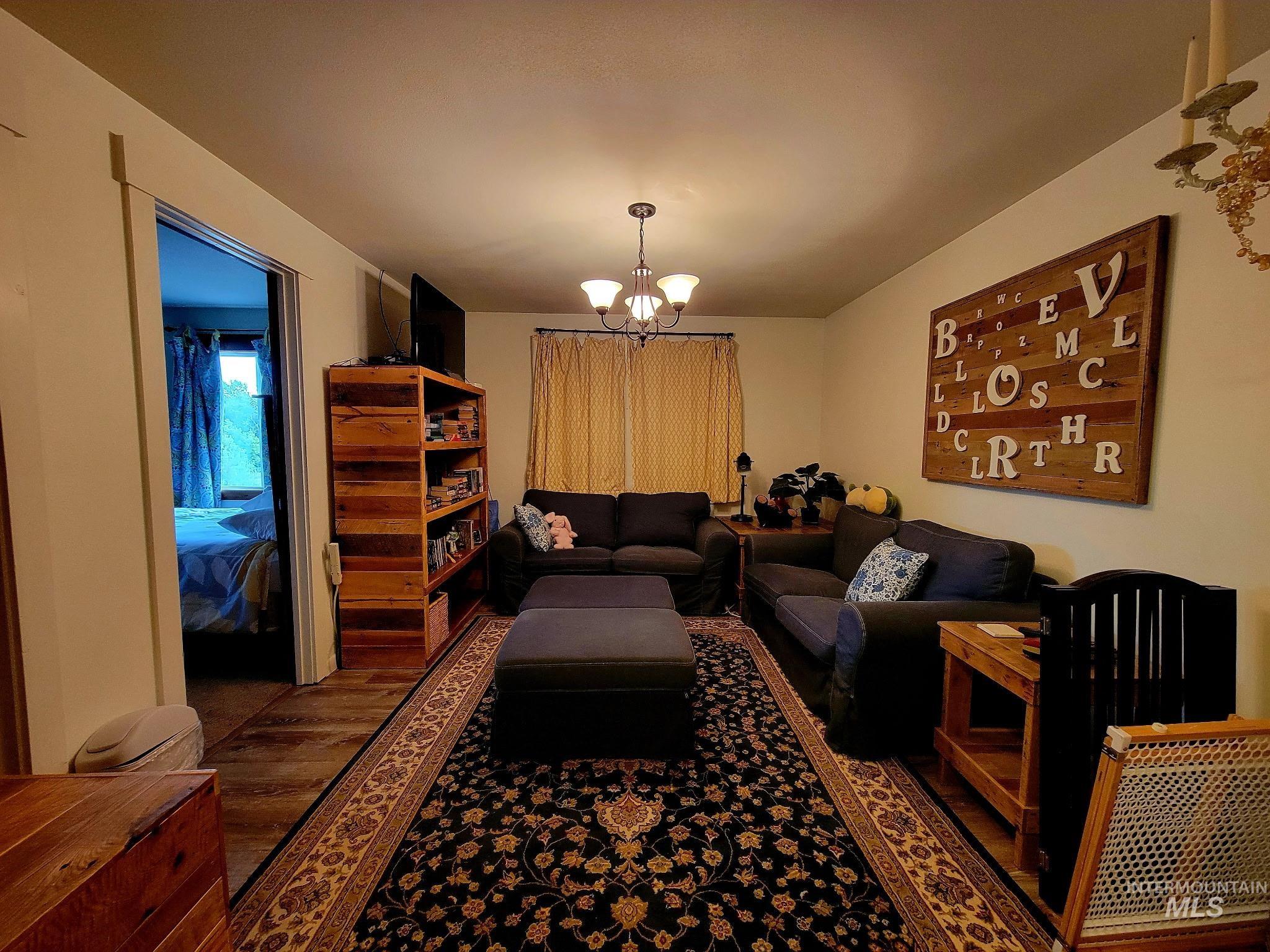 2141 Jackson Creek Road Council, ID 83612 - Photo 18 of 45 Whether it’s a good book, a close friend, or your pet by your side, the sitting room is made for cozy moments