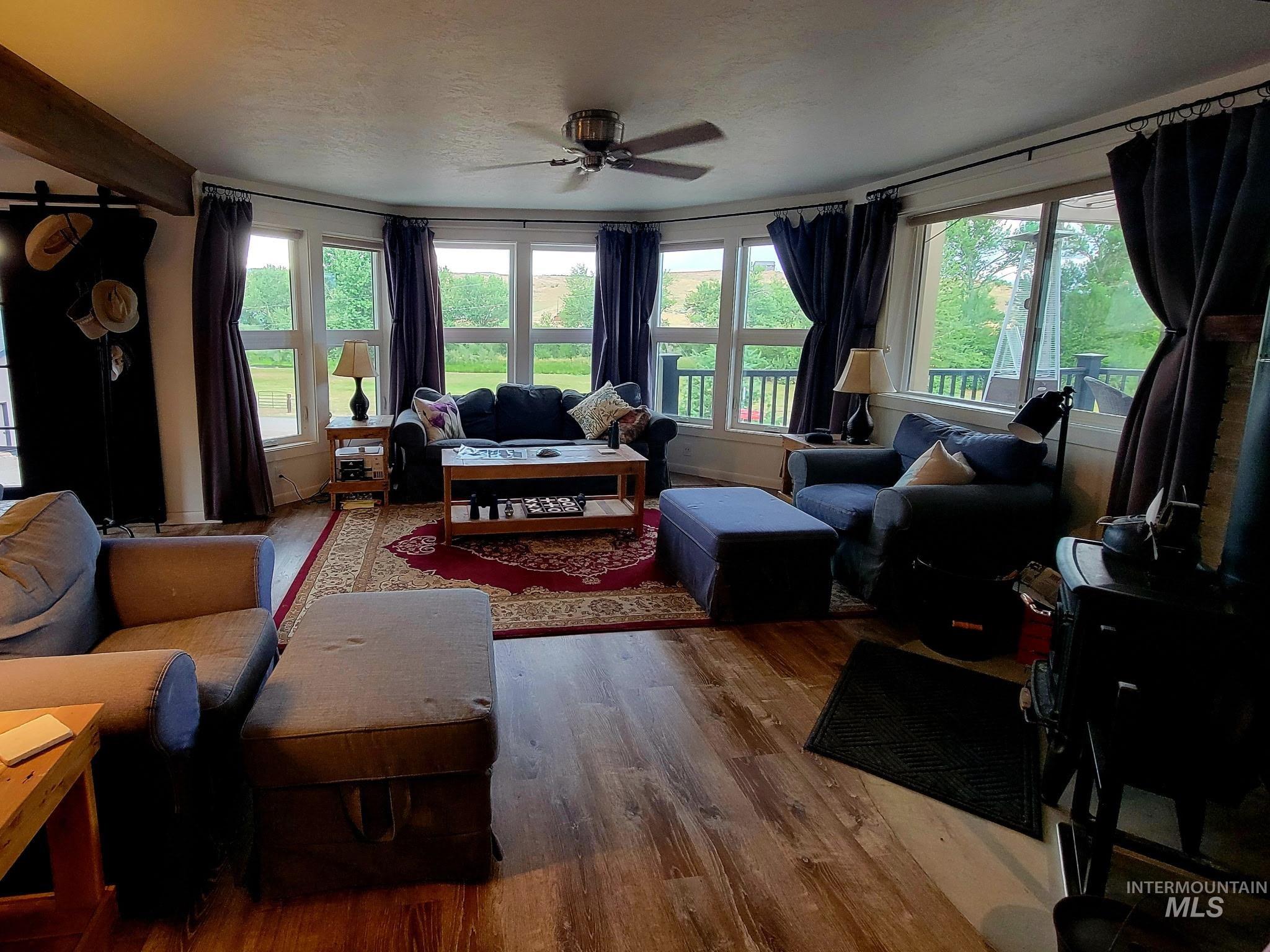 2141 Jackson Creek Road Council, ID 83612 - Photo 8 of 45 Living area featuring plenty of natural light. Most furnishings included