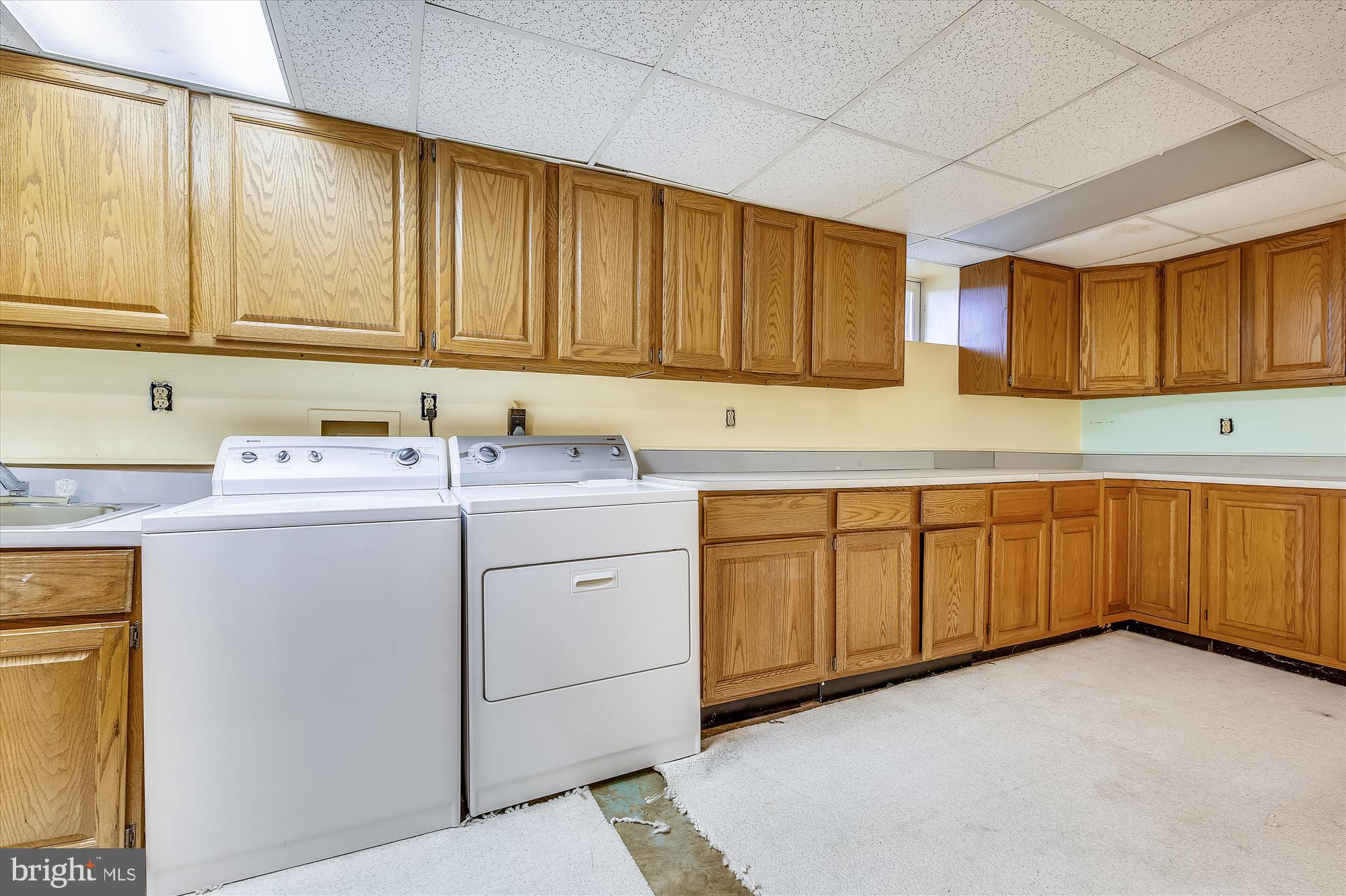 11500 Colt Terrace Silver Spring, MD 20902 - Photo 22 of 30 Washer Dryer and Cabinets