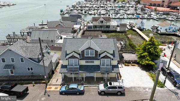 a view of a car parked in front of a house