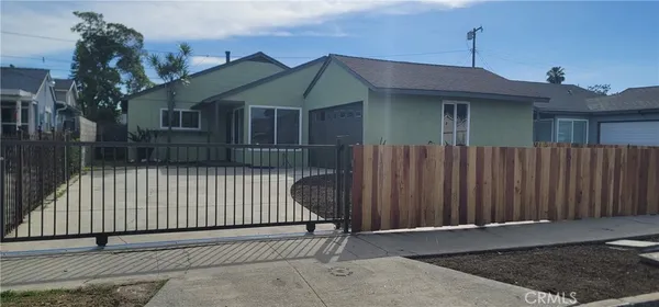 a front view of a house with a garage